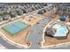 Aerial view of neighborhood showing community amenities including a pool, park, and tennis courts at 2024 Linn Cv, Waxhaw, NC 28173