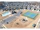 Aerial view of community park offering pool, tennis courts, and playground for active lifestyles at 2024 Linn Cv, Waxhaw, NC 28173