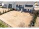 Large backyard with privacy fence, patio, and well-maintained lawn, perfect for outdoor entertaining at 2024 Linn Cv, Waxhaw, NC 28173