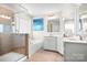 Bright bathroom features a glass shower, a tub and double sink vanity at 2024 Linn Cv, Waxhaw, NC 28173