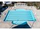 Lap swimming pool with lane markers, lounge chairs, and lush landscaping for relaxing by the water at 2024 Linn Cv, Waxhaw, NC 28173
