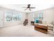 Spacious living room with plenty of natural light, neutral carpet and a plush sofa at 2024 Linn Cv, Waxhaw, NC 28173
