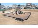 playground featuring slides, climbing equipment, a seesaw, and benches for parents at 2024 Linn Cv, Waxhaw, NC 28173