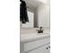 Bathroom with single sink vanity, ample counterspace, and decorative mirror at 2132 Electric Ln, Charlotte, NC 28205