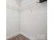 Walk-in closet with metal shelving at 2132 Electric Ln, Charlotte, NC 28205