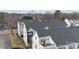 New construction townhomes feature modern design with rooftop terraces and city skyline views at 2132 Electric Ln, Charlotte, NC 28205