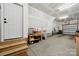 Spacious two car garage with concrete floor and white walls provides ample storage space at 2132 Electric Ln, Charlotte, NC 28205