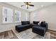 Bright living room featuring hardwood floors, recessed lighting, and a stylish sectional couch at 2132 Electric Ln, Charlotte, NC 28205