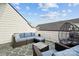 Stylish rooftop deck with cushioned seating, outdoor furniture, and scenic views at 2132 Electric Ln, Charlotte, NC 28205