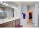 Bathroom featuring double vanity, walk-in closet, and tiled floors at 2598 Bryant Dr, Fort Mill, SC 29707