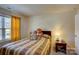 Cozy bedroom with a window and bedside table at 2598 Bryant Dr, Fort Mill, SC 29707