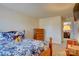 Comfortable bedroom with carpeted floors, a chest of drawers and a doorway leading to an adjacent room at 2598 Bryant Dr, Fort Mill, SC 29707