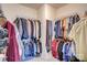 Well-organized walk-in closet with hanging rods and shelving offering efficient clothes and accessories storage at 2598 Bryant Dr, Fort Mill, SC 29707