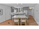 Stylish kitchen featuring gray cabinets, stainless steel appliances, and a large center island at 2911 N Myers St, Charlotte, NC 28205