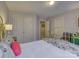 Bedroom with decorative bedding, and a double door closet for ample storage at 3308 Oscar Dr, Matthews, NC 28105