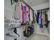 Walk-in closet with metal racking system, shelves, and hanging storage at 3308 Oscar Dr, Matthews, NC 28105