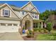 Charming two-story home boasts stone accents, a two-car garage, and a well-manicured lawn at 3308 Oscar Dr, Matthews, NC 28105