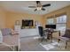 Office space with desk, monitors, and large windows at 3308 Oscar Dr, Matthews, NC 28105
