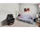 Spare bedroom with carpet, gray couch, and brown leather chair at 3643 Melrose Cottage Dr, Matthews, NC 28105