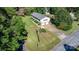 Aerial view of home with well-manicured lawn, and mature trees at 3808 22Nd Street Ne Ct, Hickory, NC 28601