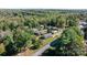 Scenic aerial view of home surrounded by lush greenery and mature trees at 3808 22Nd Street Ne Ct, Hickory, NC 28601