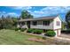 Charming home featuring a well-maintained yard, neutral siding, and mature landscaping at 3808 22Nd Street Ne Ct, Hickory, NC 28601