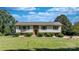Classic split-level home with brick accents, shutters, and a well-manicured front lawn at 3808 22Nd Street Ne Ct, Hickory, NC 28601