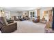 Open living area with multiple seating options, ceiling fan, and lots of space at 3808 22Nd Street Ne Ct, Hickory, NC 28601