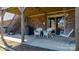 Covered patio space featuring comfortable seating, ideal for relaxing outdoors with easy access to the backyard at 3808 22Nd Street Ne Ct, Hickory, NC 28601