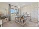 Bright home office with stylish wallpaper, natural light, and a comfortable workspace at 407 Sunharvest Ln, Indian Trail, NC 28079