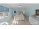 Charming bedroom with soft blue walls, white carpet and furnishings, and bright window at 4300 Denbigh Dr, Charlotte, NC 28226