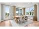 Bright dining room featuring a wood table, stylish chairs, and large windows showcasing the outdoor view at 4775 Formation Dr # 99, Lancaster, SC 29720