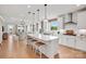 Bright, open kitchen with a large island, white cabinets, and stainless steel appliances at 4775 Formation Dr # 99, Lancaster, SC 29720