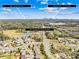 Aerial view of neighborhood and city skyline at 4928 Tuckaseegee Rd, Charlotte, NC 28208