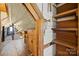 Unique attic space with wooden beams, built-in storage, and natural light, perfect for a bonus room at 4928 Tuckaseegee Rd, Charlotte, NC 28208