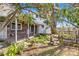The backyard offers a wooden porch and an area to garden and entertain guests at 4928 Tuckaseegee Rd, Charlotte, NC 28208
