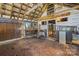 Interior of rustic barn with a wooden frame, dirt floor, and natural light at 4928 Tuckaseegee Rd, Charlotte, NC 28208