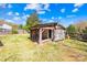 Wooden shed in backyard of home at 4928 Tuckaseegee Rd, Charlotte, NC 28208