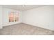 Standard carpeted bedroom with one window at 5672 Wrenfield Ct, Charlotte, NC 28277