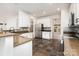 Modern kitchen featuring granite countertops, stainless steel appliances, and custom cabinets at 5672 Wrenfield Ct, Charlotte, NC 28277