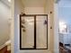 Spacious shower with a sliding door and built-in shelving, adjacent to a toilet at 572 Church St, Locust, NC 28097