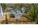 Aerial view of a home featuring a fenced backyard, a patio, and a well-maintained exterior at 574 Reid St, Belmont, NC 28012