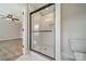 Modern bathroom with glass enclosed shower featuring white subway tile and dark fixtures at 574 Reid St, Belmont, NC 28012