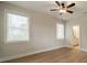 Clean bedroom showcasing natural light and neutral tones for relaxation at 576 Reid St, Belmont, NC 28012