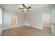 Spacious bedroom showcasing a neutral color scheme, bright light, and ensuite bath access at 576 Reid St, Belmont, NC 28012