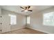 Neat bedroom enhanced by natural light, ceiling fan and two windows at 576 Reid St, Belmont, NC 28012