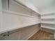 Spacious walk-in closet featuring custom shelving and ample storage, perfect for organization at 576 Reid St, Belmont, NC 28012