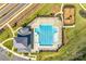 Aerial view of the community pool, splash pad, clubhouse and playground, showcasing the amenities at 7133 Yardley St, Gastonia, NC 28056