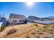 Spacious backyard with a patio, landscaping, and well-maintained lawn, providing ample outdoor living space at 7133 Yardley St, Gastonia, NC 28056