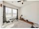 Bright, carpeted bedroom with large windows and exercise equipment at 7133 Yardley St, Gastonia, NC 28056